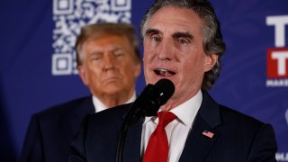 File - Doug Burgum and former President Donald Trump during a campaign rally at The Margate Resort on January 22, 2024, in Laconia, New Hampshire.