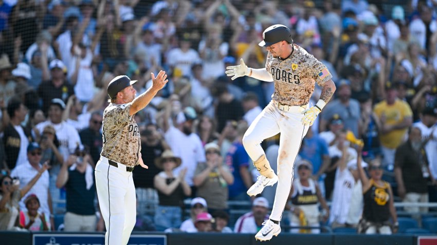 SAN DIEGO, CA – AUGUST 25: Jackson Merrill #3 of the San Diego Padres celebrates his walk-off solo home run in the ninth inning with Tim Leiper #33 against the New York Mets August 25, 2024 at Petco Park in San Diego, California. (Photo by Denis Poroy/Getty Images)