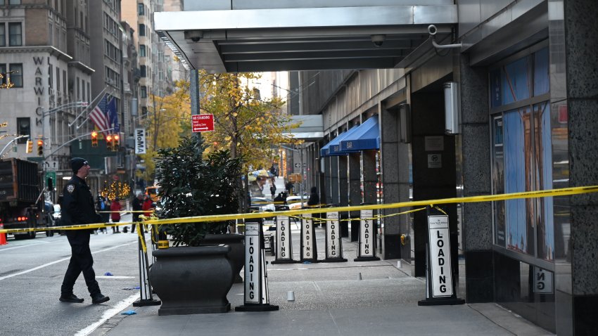 Police officers take security measures as CEO of UnitedHealthcare Brian Thompson shot and killed in Midtown Manhattan, New York, United States on December 4, 2024.