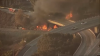 Brush fire sparks under overpass in National City