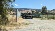 Concerned parents took these photos of trucks unloading part of Saratoga High School's old artificial turf field at a property in San Martin.