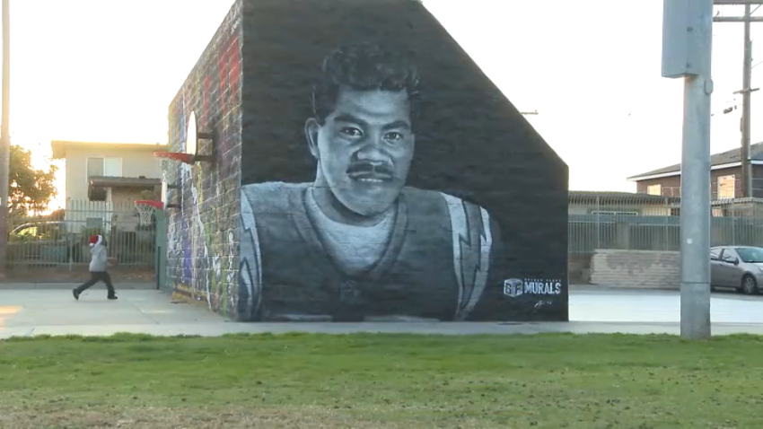 A mural of the late Chargers star and NFL Hall of Famer Junior Seau was unveiled in Oceanside.