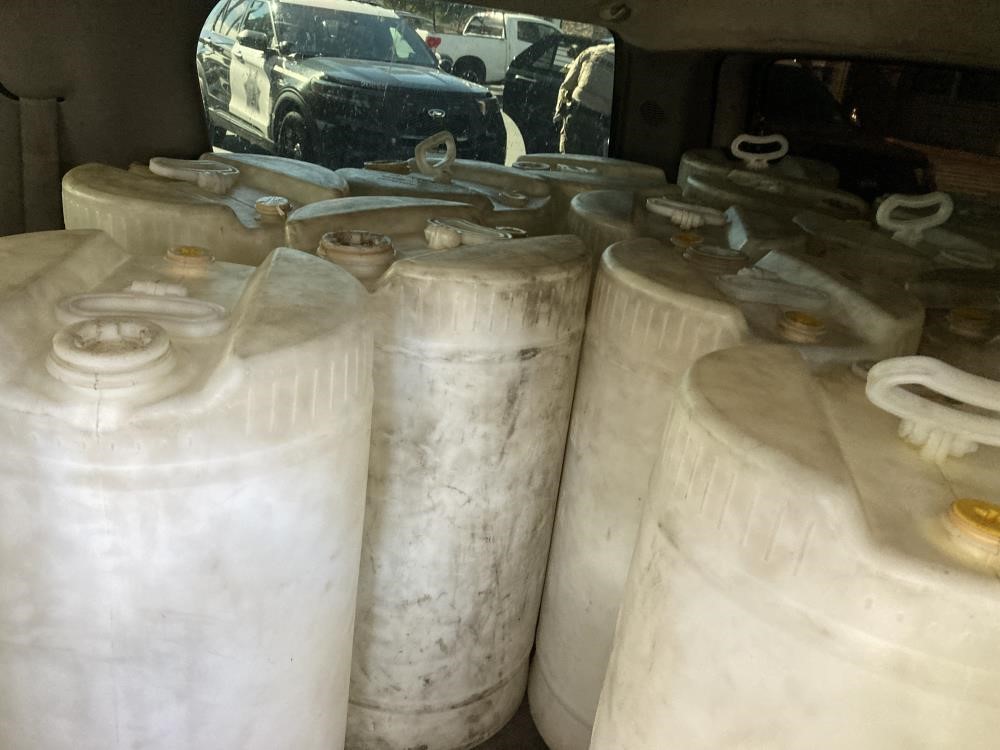 Containers suspected of carrying stolen fuel were found in a vehicle belonging to the arrestee, the San Diego County Sheriff's Department said.