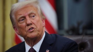 U.S. President Donald Trump speaks on the day he signs documents as he issues executive orders and pardons for Jan. 6 defendants in the Oval Office at the White House on Inauguration Day on Jan. 20, 2025.