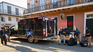 FBI investigators arrive at the scene in New Orleans