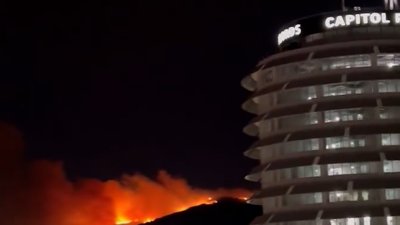 Sunset Fire seen burning behind the Capitol Records building