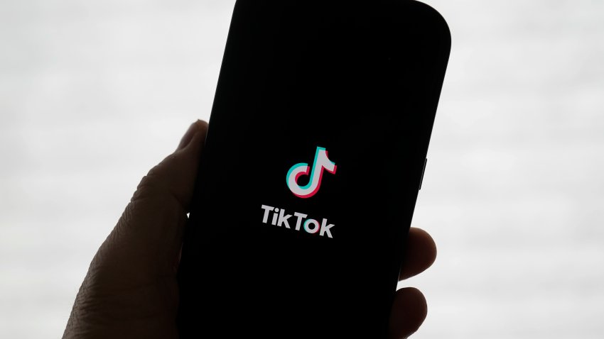 A TikTok logo is shown on a phone in San Francisco, Friday, Jan. 17, 2025.