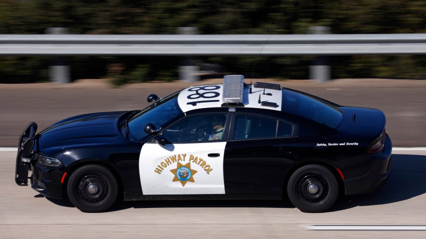 SAN DIEGO, CALIFORNIA – SEPTEMBER 28:  A California Highway Patrol officer drives on State Route 52 on September 28, 2024 in San Diego, California.  (Photo by Kevin Carter/Getty Images)