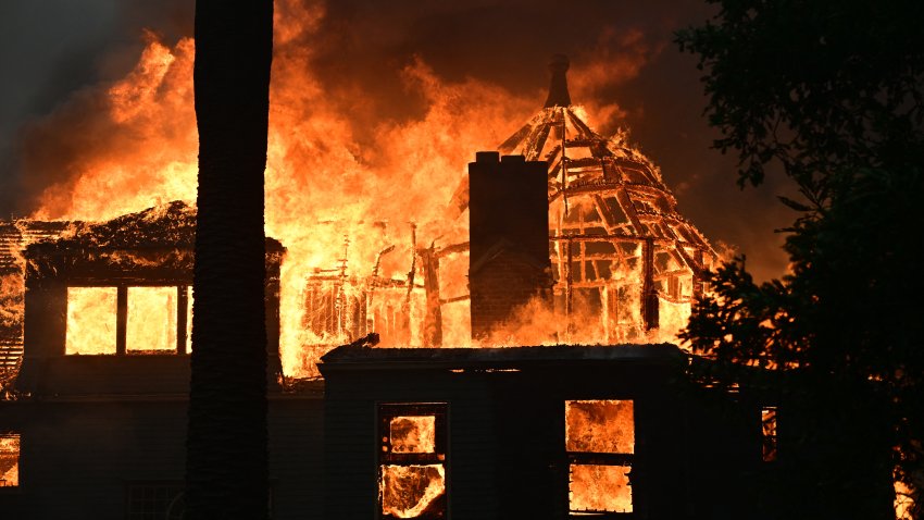 A home burns during the Eaton Fire in Altadena on Jan. 8, 2025.