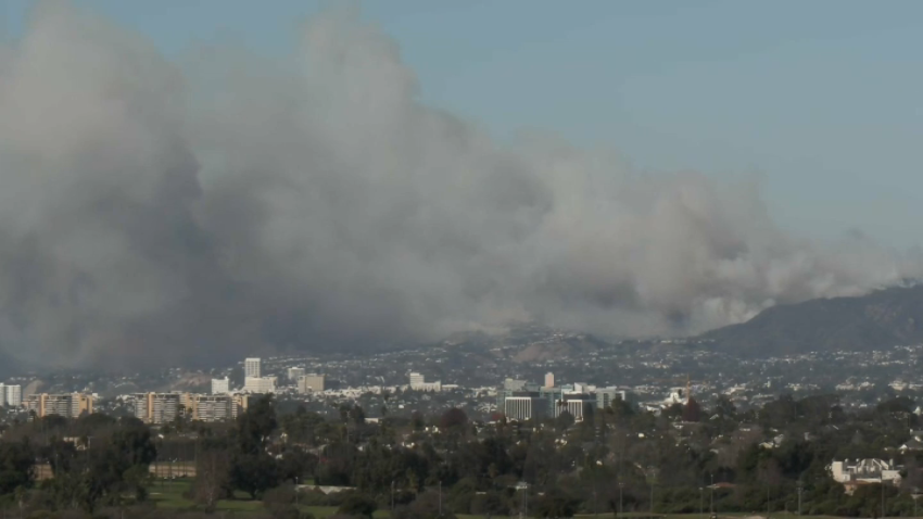 A fire burns in the Pacific Palisades area of Southern California.