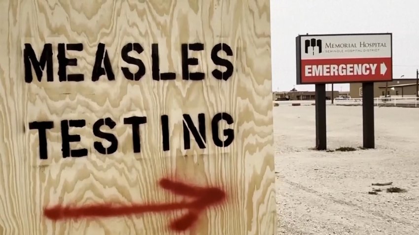 A sign for a measles testing location.