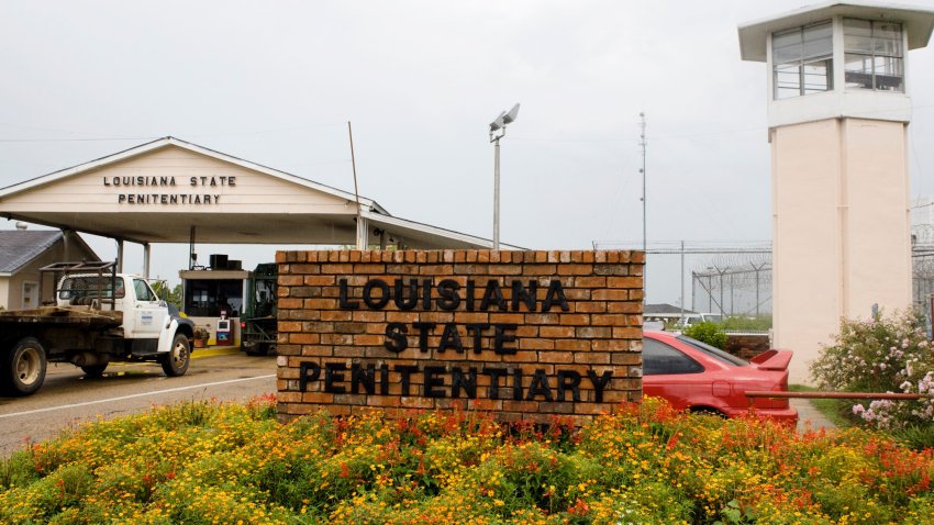 FILE – Vehicles enter at the main security gate at Louisiana State Penitentiary in Angola, La., Aug. 5, 2008.