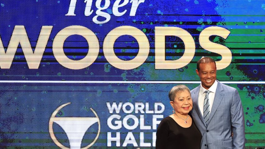 Tiger Woods and his mother Kultida Woods pose for photos prior to his induction at the 2022 World Golf Hall of Fame Induction at the PGA TOUR Global Home