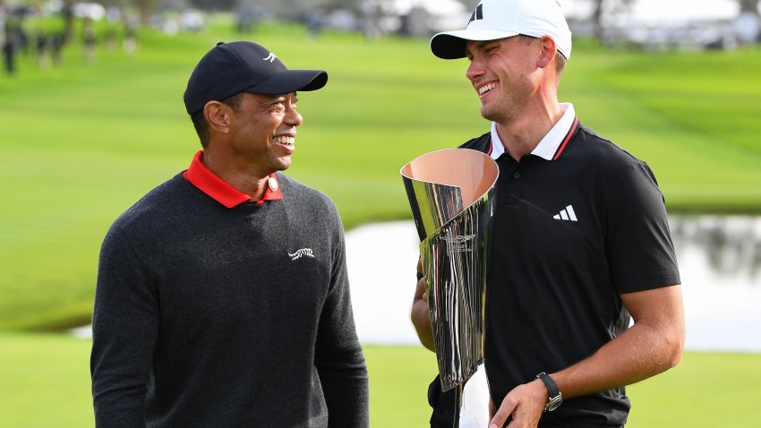 LA JOLLA, CA – FEBRUARY 16: Ludvig Aberg holds the trophy, next to Tiger Woods, after winning The Genesis Invitational 2025 at Torrey Pines Golf Course on February 16, 2025 in La Jolla, California. (Photo by Brian Rothmuller/Icon Sportswire via Getty Images)