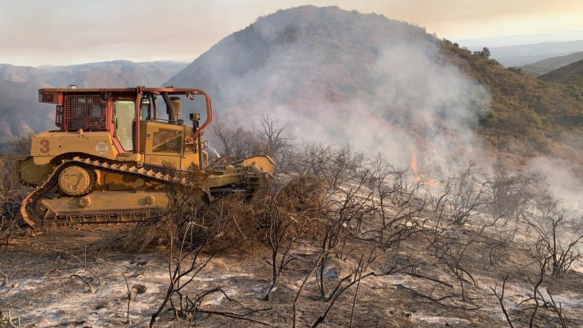 A bulldozer at the scene of the Airport Fire in September 2025.