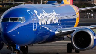 A Southwest Airlines Boeing 737 MAX is pushed back from the gate at San Diego International Airport in San Diego, Aug. 24, 2024.