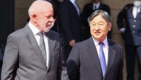 Brazil’s President Luiz Inacio Lula da Silva (L) walks with Japan’s Emperor Naruhito (R) during a welcoming ceremony at the Imperial Palace in Tokyo on March 25, 2025. 