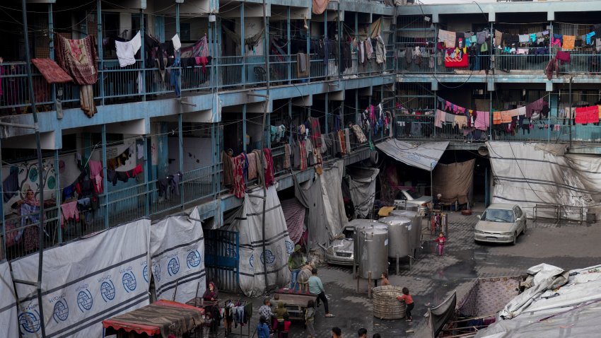 Displaced Palestinians lives in a school run by UNRWA