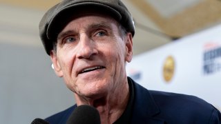 FILE – James Taylor appears at the presentation of the Gershwin Prize, honoring Joni Mitchell, at DAR Constitution Hall in Washington on March 1, 2023.