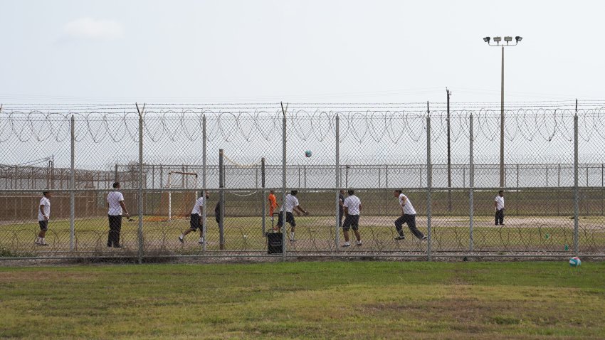 Immigration detainees play outside at the Port Isabel Detention Center in Los Fresnos, Texas, on June 10, 2024.