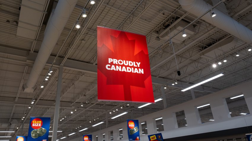 A "Proudly Canadian" banner hangs from the ceiling at the Real Canadian Superstore on March 3, 2025 in Toronto, Canada.