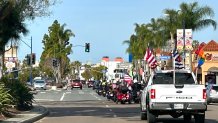 A caravan with motorcycles and a pickup route start a memorial along the University Avenue in the heart of Hillcrest, March 16, 2025.