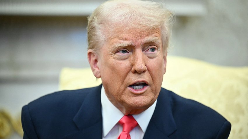 President Donald Trump speaks to reporters in the Oval Office on Wednesday.