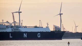 A ship carrying liquefied natural gas (LNG) is towed out of the Port of Rotterdam on January 13, 2025 in Rotterdam, Netherlands.
