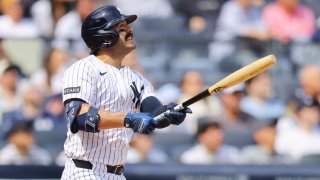New York Yankees catcher Austin Wells hits a home run with a torpedo bat in the first inning against the Milwaukee Brewers at Yankee Stadium on March 29, 2025.