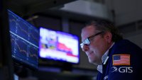 A trader works during the closing bell, on the floor at the New York Stock Exchange (NYSE) in New York City, U.S., April 10, 2025. 