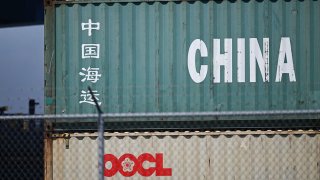 A China Shipping cargo container sits stacked at the Port of Long Beach in Long Beach, California on April 10, 2025.