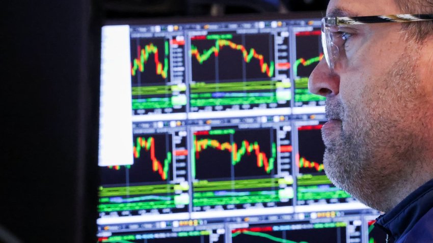 Traders work on the floor at the New York Stock Exchange (NYSE) in New York City, U.S., April 17, 2025.