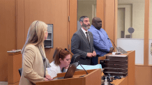 Actor Faizon Love (right) appears alongside his public defender Marc Kligman (left) for a criminal court hearing in Downtown San Diego on April 16, 2025.