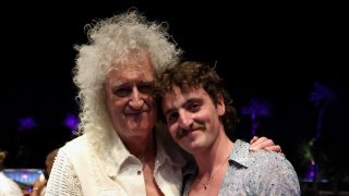 INDIO, CALIFORNIA – APRIL 11: (FOR EDITORIAL USE ONLY) Brian May and Benson Boone pose backstage at the Coachella Stage during the 2025 Coachella Valley Music and Arts Festival at Empire Polo Club on April 11, 2025 in Indio, California. (Photo by Kevin Mazur/Getty Images for Coachella)