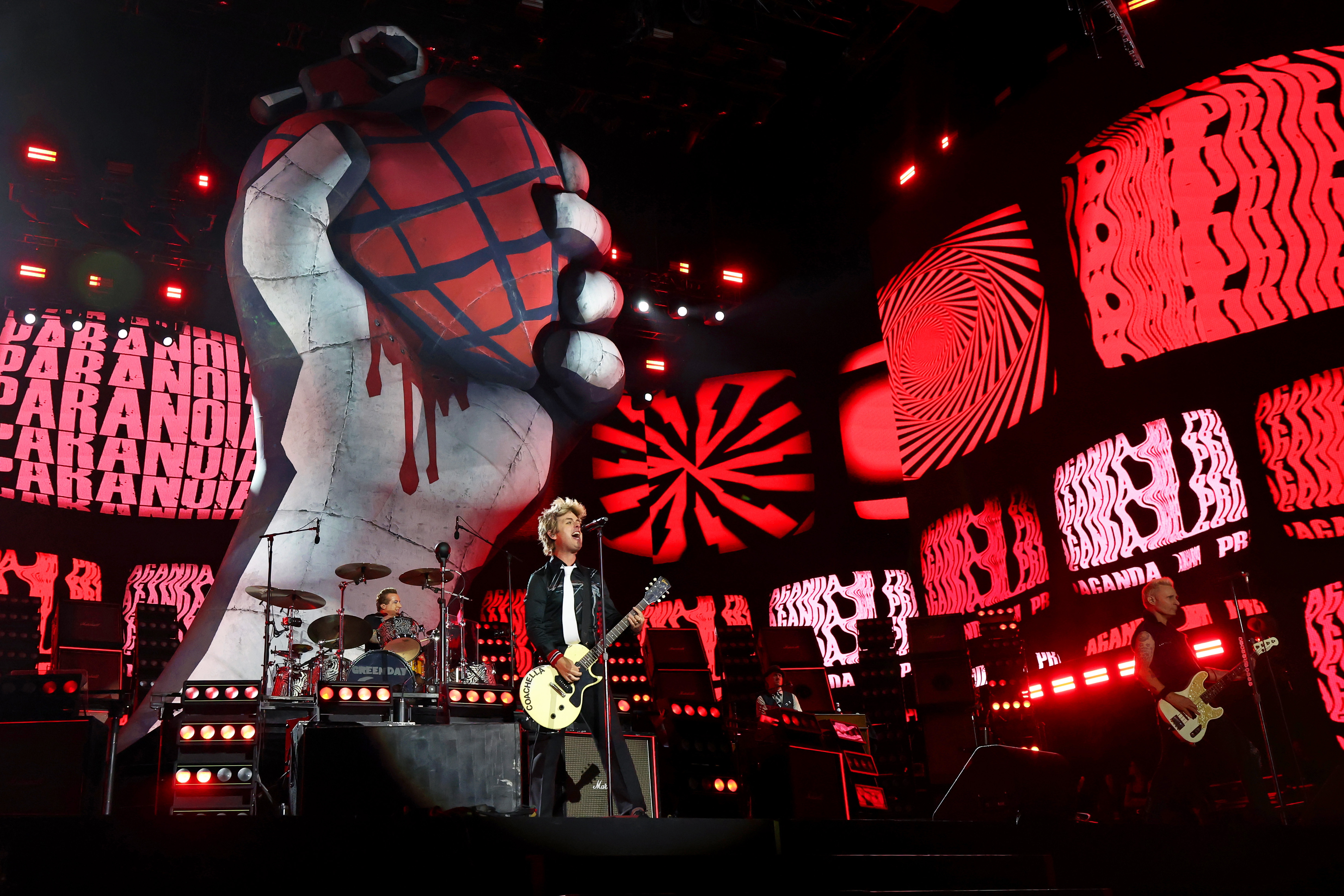 INDIO, CALIFORNIA – APRIL 12: Tré Cool, Billie Joe Armstrong, and Mike Dirnt of Green Day perform at the Coachella Stage during the 2025 Coachella Valley Music and Arts Festival at Empire Polo Club on April 12, 2025 in Indio, California. (Photo by Kevin Mazur/Getty Images for Coachella)