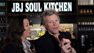 FILE - Jon Bon Jovi and his wife Dorothea speak to the media after opening the BEAT (Bringing Everyone All Together) center in Toms River, New Jersey, on May 10, 2016.