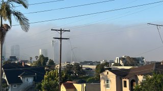 A gray haze hangs over downtown San Diego on April 9, 2025.