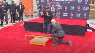 Ice Cube prepares to place his handprints in cement at the TCL Chinese Theatre April 15, 2025.