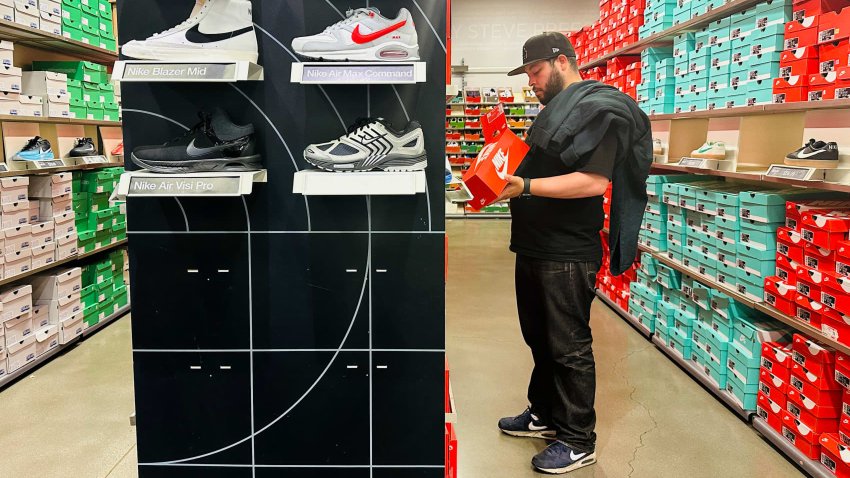 A man shops for shoes at a Nike outlet store in Los Angeles on April 10, 2025.