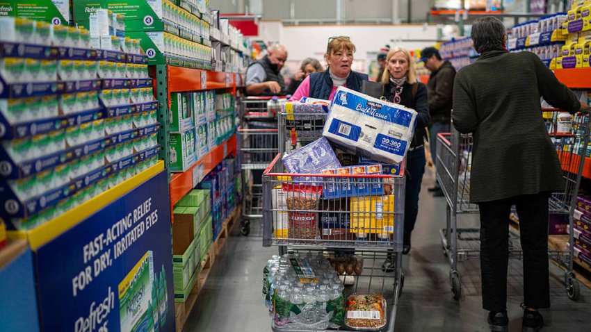 Customers look over personal health items displayed on April 18, 2025 at a Costco branch in Niantic, Connecticut.