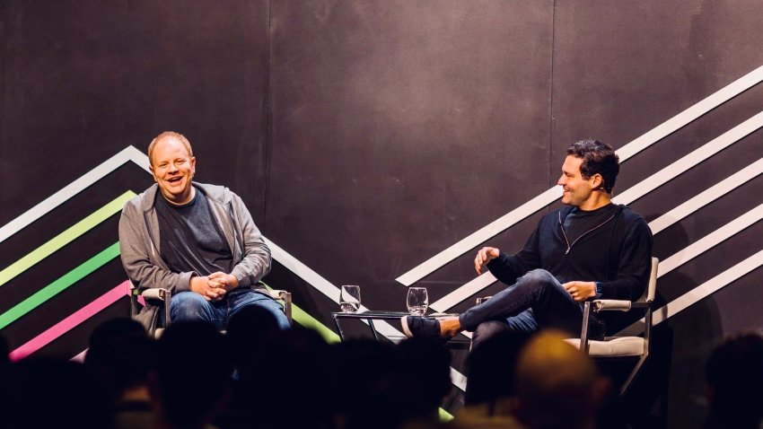 From left, Parker Conrad, co-founder and CEO of Rippling, and Kleiner Perkins investor Ilya Fushman speak at the venture firm’s Fellows Founders Summit in San Francisco in September 2022.