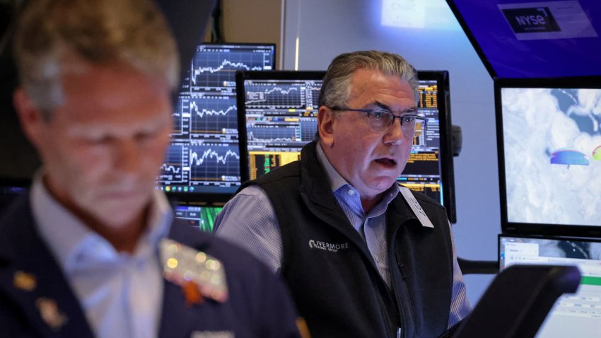 A trader works on the floor at the New York Stock Exchange on May 12, 2025.