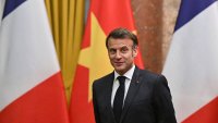 TOPSHOT – France’s President Emmanuel Macron reacts during a meeting with Vietnam’s President Luong Cuong sat the Presidential Palace in Hanoi on May 26, 2025. (Photo by Nhac NGUYEN / POOL / AFP) (Photo by NHAC NGUYEN/POOL/AFP via Getty Images)