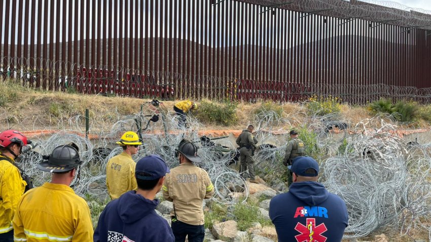 Cal Fire and U.S. Border Patrol crews at the scene of a rescue near the U.S.-Mexico border on May 16, 2025.