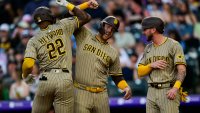 DENVER, CO – MAY 10: San Diego Padres outfielder Jason Heyward (22) celebrates his fourth inning three-run home run with Gavin Sheets (30) and Jackson Merrill (3) during a game between the San Diego Padres and the Colorado Rockies at Coors Field on May 10, 2025 in Denver, Colorado. (Photo by Dustin Bradford/Icon Sportswire via Getty Images)