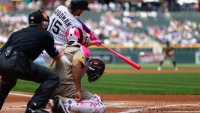 DENVER, CO – MAY 11: Hunter Goodman #15 of the Colorado Rockies hits a three-run home run in the first inning against the San Diego Padres at Coors Field on May 11, 2025 in Denver, Colorado. (Photo by Justin Edmonds/Getty Images)