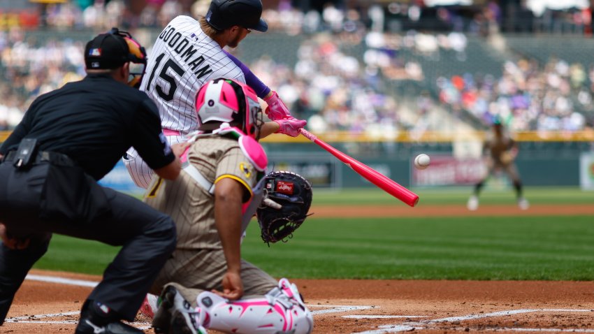 DENVER, CO – MAY 11: Hunter Goodman #15 of the Colorado Rockies hits a three-run home run in the first inning against the San Diego Padres at Coors Field on May 11, 2025 in Denver, Colorado. (Photo by Justin Edmonds/Getty Images)