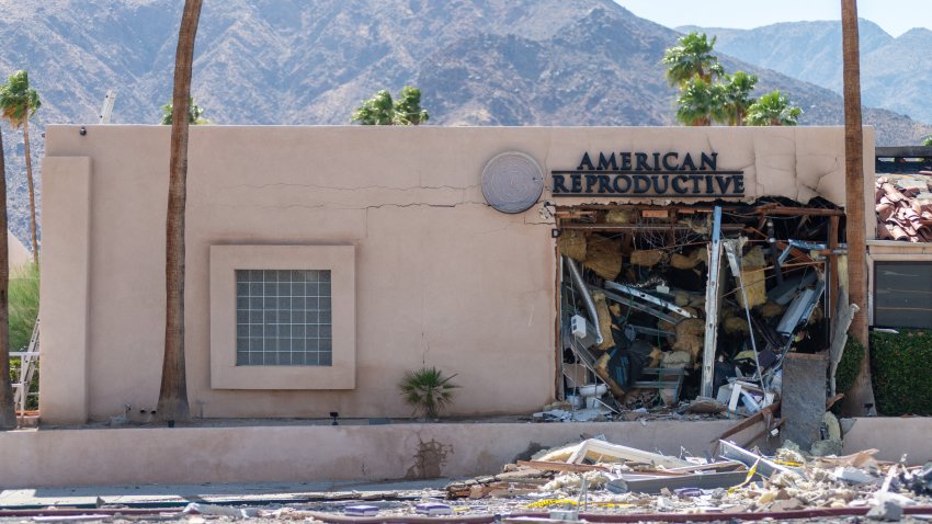 Debris is seen outside a damaged American Reproductive Centers fertility clinic after a bomb blast outside the building in Palm Springs, California, on May 17, 2025. A bomb blast outside a California fertility clinic killed one person Saturday, in what the US attorney general called an “unforgivable” attack. The blast ripped through downtown Palm Springs, badly damaging the clinic and blowing out the windows and doors of other nearby buildings. (Photo by Gabriel Osorio / AFP) (Photo by GABRIEL OSORIO/AFP via Getty Images)