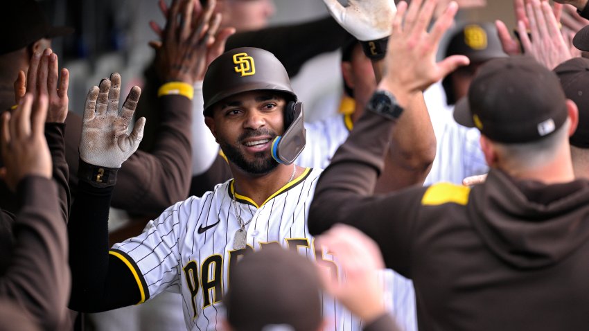 SAN DIEGO, CALIFORNIA – MAY 14: Xander Bogaerts #2 of the San Diego Padres is congratulated in the dugout after hitting a three-run home run against the Los Angeles Angels during the first inning at Petco Park on May 14, 2025 in San Diego, California. (Photo by Orlando Ramirez/Getty Images)