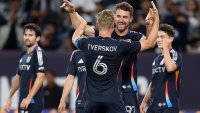 SAN DIEGO, CALIFORNIA – MAY 14: Jeppe Tverskov #6 congratulates Christopher McVey #97 of San Diego FC after his goal during the first half of a game against the Colorado Rapids at Snapdragon Stadium on May 14, 2025 in San Diego, California. (Photo by Sean M. Haffey/Getty Images)
